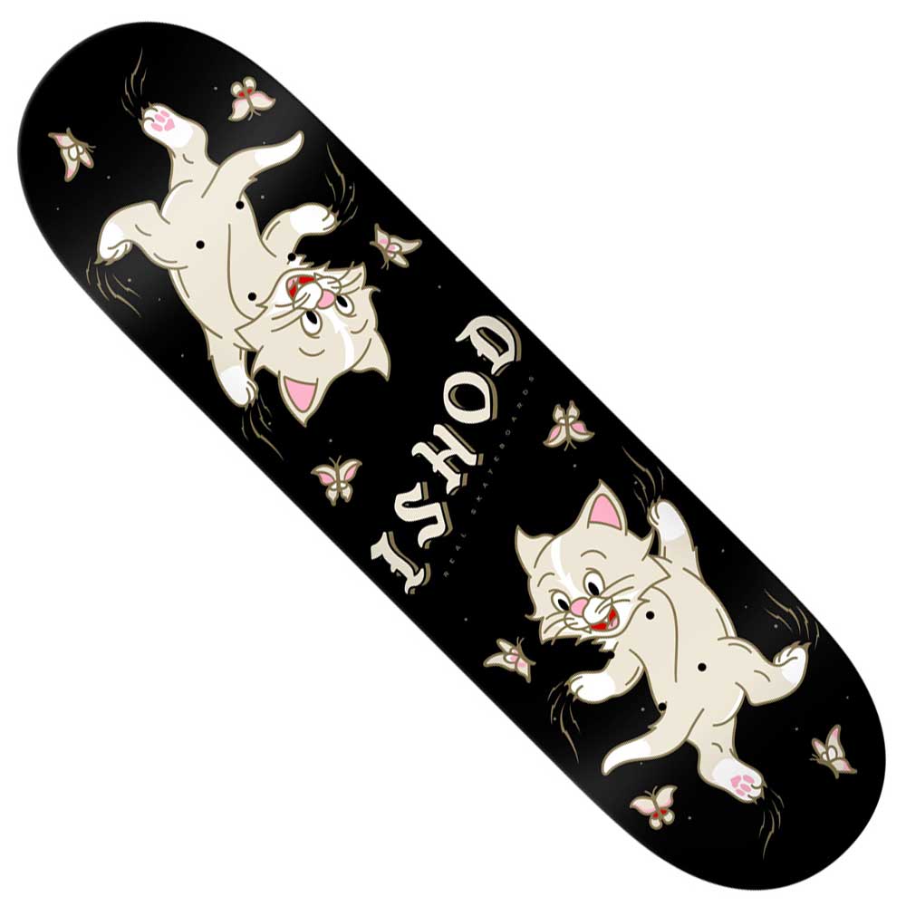 The Ishod Kitten Scratch 8.5x32.25 Twin Tail Real Skateboards deck showcases two light-colored cartoon kittens with pink noses and paws, surrounded by tiny flies, set against a black background. Playful "ISHOD" lettering is displayed between the kittens—ideal for fans of the Kitten Scratch Twin Tail design by Real Skateboards.
