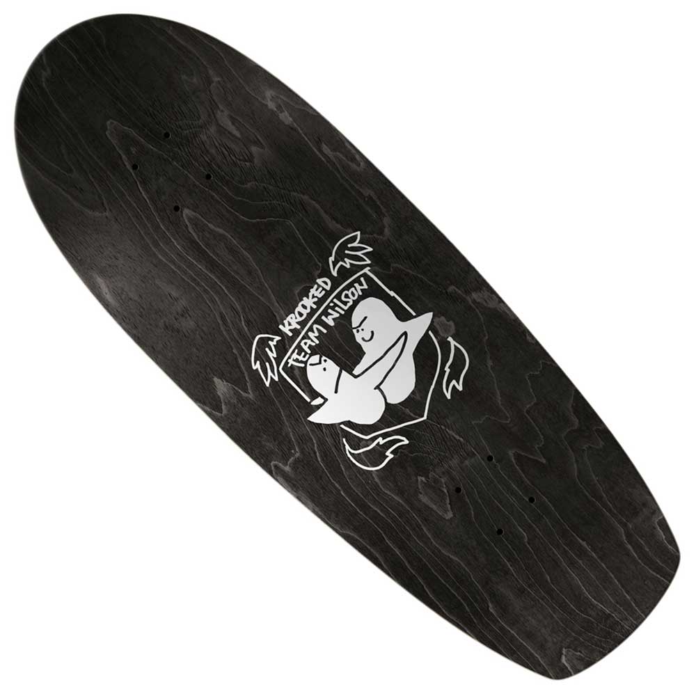 The J Wilson Zogger 10.75 Krooked Skateboards Deck Shaped is a black skateboard deck from Krooked Skateboards, featuring a white graphic of two cartoon birds hugging and surrounded by a "Krooked Team Wilson" banner. This distinctive design celebrates the J Wilson Zogger collaboration and makes a standout addition to any skateboard collection.
