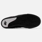 The image shows the black rubber outsole of the Jamie Foy Eclipse White 306 NSN New Balance Numeric Suede Skateboarding Shoe, featuring a herringbone tread and a gray heel section with the NB New Balance logo.