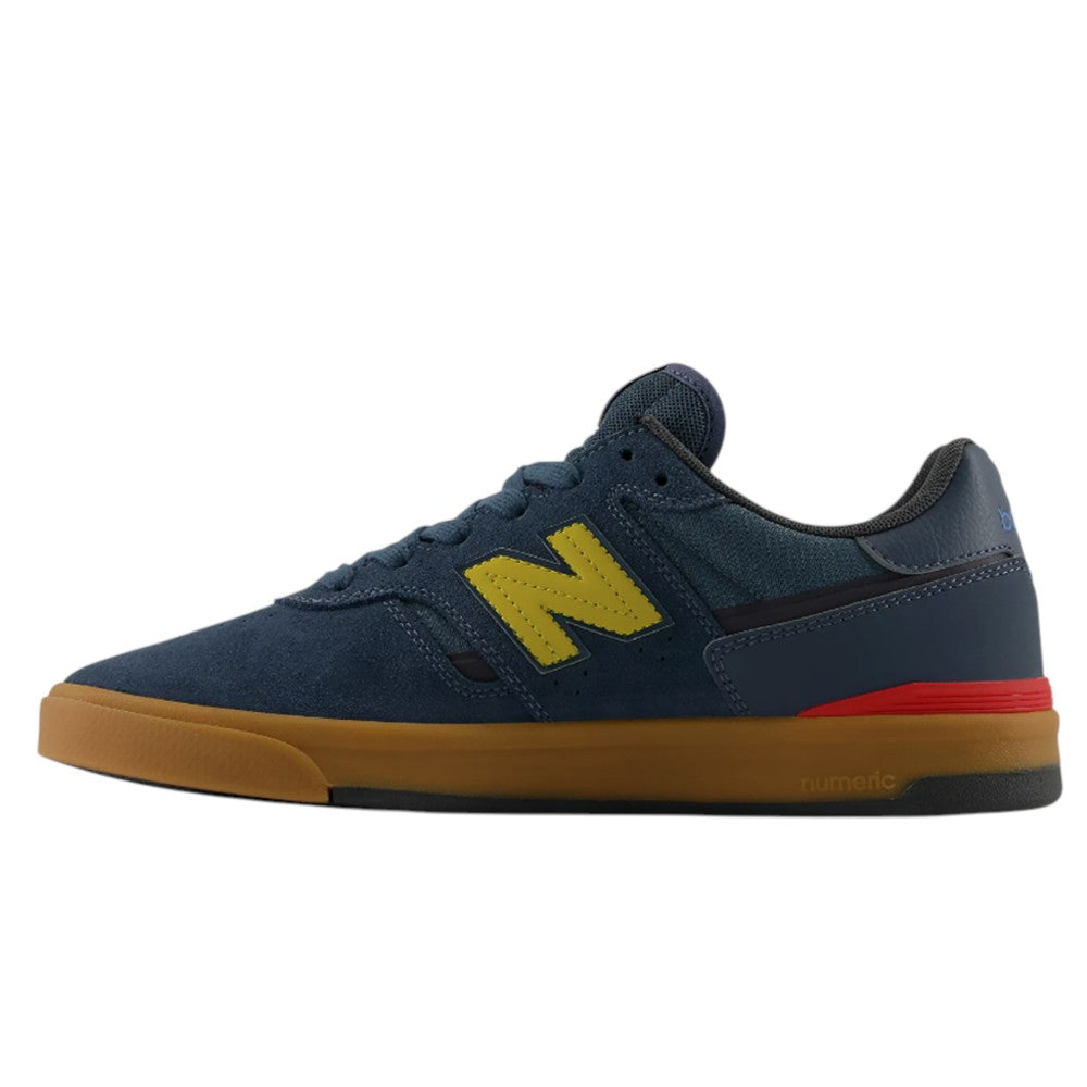 Navy blue Jamie Foy Cup 306 CON New Balance Numeric suede skateboarding shoes with a yellow N logo and a gum rubber sole.