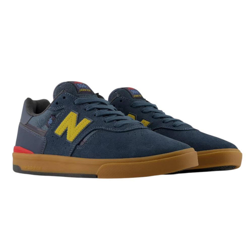 Dark blue Jamie Foy Cup 306 CON New Balance Numeric suede skateboarding shoes featuring yellow side logos and gum rubber soles.