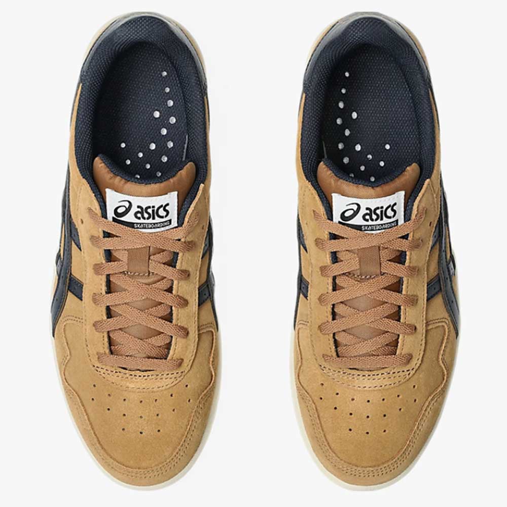 Top-down view of two tan suede Japan Pro Asics Caramel Midnight 1203B203200 skateboarding sneakers with dark blue side stripes, tan laces, and white soles.
