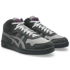 The Japan Pro MT Asics Graphite Gray Cay Red 1203B088 021 Suede Skateboarding Shoes are high-top skate shoes in gray and dark gray with a suede upper, white laces, black soles, purple tongue logos, and signature side stripes.