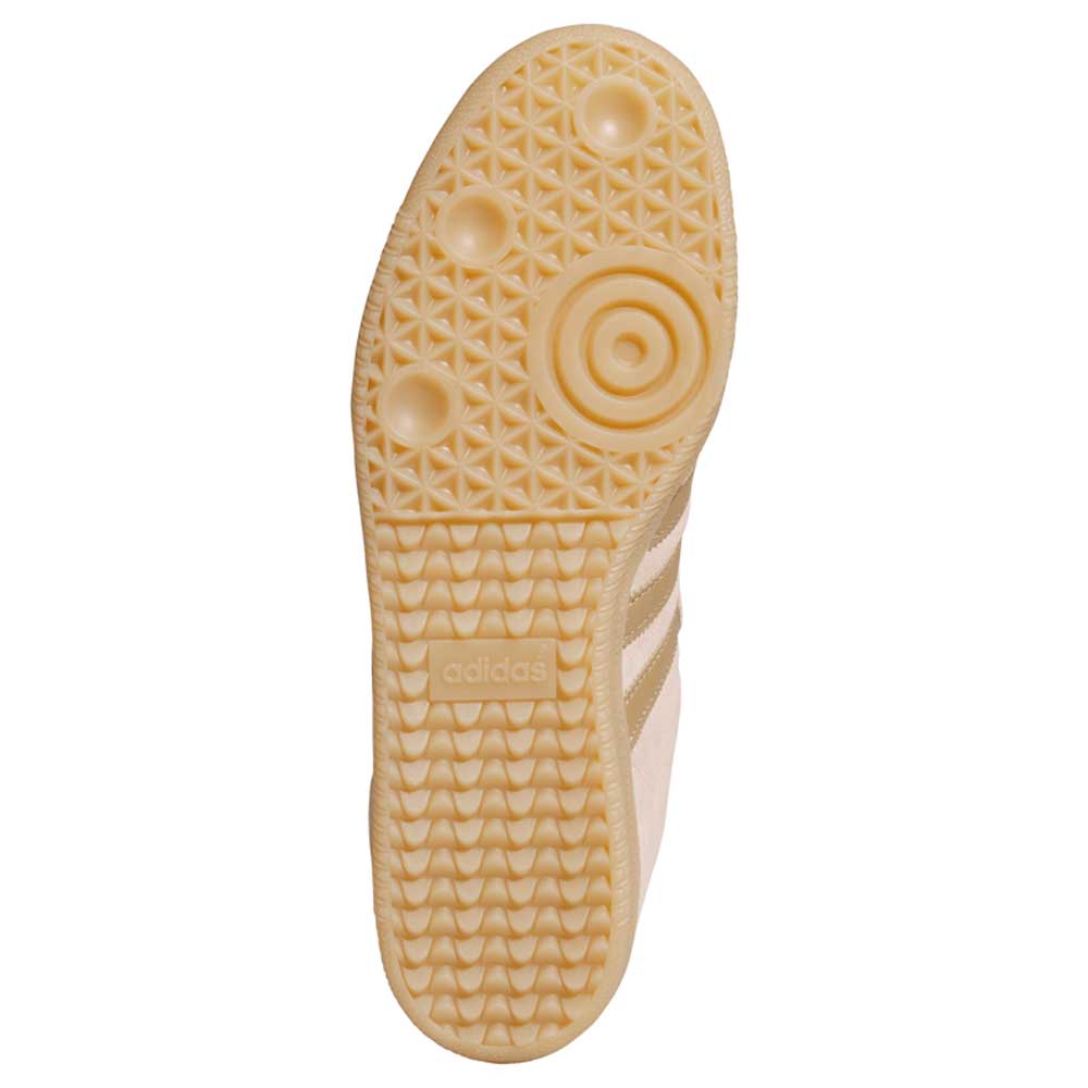 The image displays the bottom view of the KI5090 Pink Gum Samba ADV Adidas Skateboarding Suede Shoe, featuring a textured light brown rubber sole with geometric and circular patterns plus an embossed adidas logo in the center.