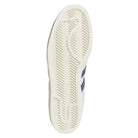 The image shows the outsole of the KJ0210 White Blue Pro Model 80 ADV Adidas Skateboarding Leather Shoes, featuring a white sole with a herringbone tread and wavy groove. Part of the blue and white leather upper is visible on the side.