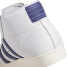 Close-up of the KJ0210 White Blue Pro Model 80 ADV Adidas Skateboarding Leather Shoes, featuring a premium white leather upper, navy blue stripes, detailed stitching on the heel, and an off-white outsole for a classic sporty look.