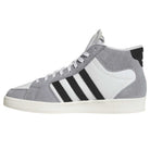 The KJ5031 Adidas Superskate Gray Black Skateboarding Shoe features black stripes, a suede upper, white laces, and a light-colored sole, shown in side profile.