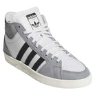 The KJ5031 Adidas Superskate features a gray and white suede upper with black stripes, white laces, a white sole, and a black-and-white Adidas logo on the tongue—ideal for classic skateboarding shoe style.