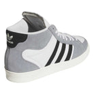 The KJ5031 Adidas Superskate Gray Black Skateboarding Shoe features a gray suede upper, black adidas stripes, white sole, and adidas logo on the black heel tab. Displayed at an angle revealing both the back and side views.