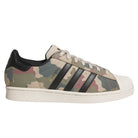 The KJ5120 Camouflage Black Superstar ADV Adidas Skateboarding Suede Shoes feature a low-top design with a camouflage pattern, black stripes, white shell toe and sole, black heel tab, and gold SUPERSTAR text—perfect for skateboarding style.