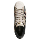 Top view of the KJ5120 Camouflage Black Superstar ADV Adidas Skateboarding Suede Shoes featuring a beige, green, black, and pink camo pattern, white shell toe and laces, plus gold adidas Originals branding on the tongue—perfect for standout skate style.