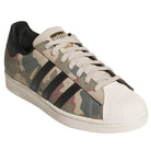 The KJ5120 Camouflage Black Superstar ADV Adidas Skateboarding Suede Shoes feature a camo pattern, black stripes, white shell toe and laces, gold branding, black heel tab—classic adidas Originals style.