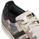 Close-up of the KJ5120 Camouflage Black Superstar ADV Adidas Skateboarding Suede Shoes, featuring a camo pattern, white laces, black stripes, black heel tab, and a gold Adidas logo—an iconic pick from adidas Originals.