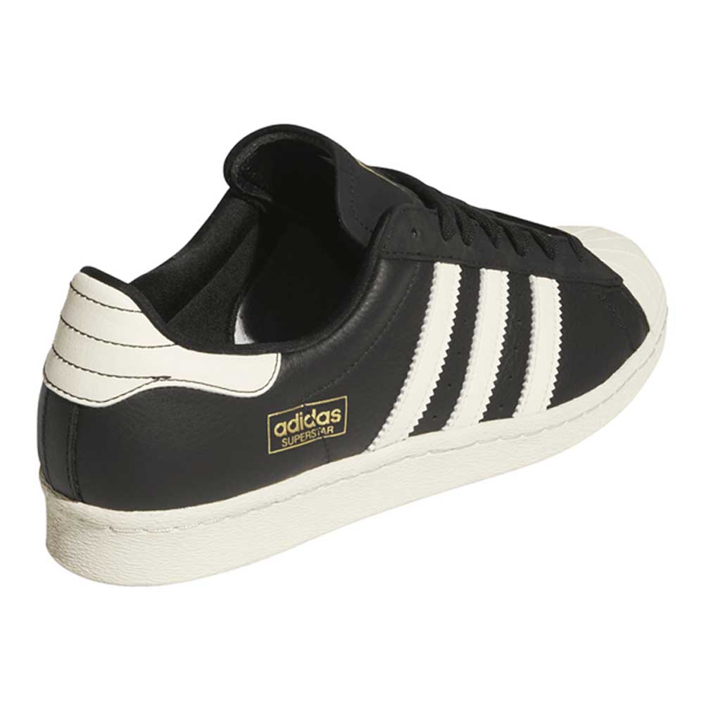 The KK5003 Black White Superstar 80 ADV Adidas Skateboarding Leather Shoes feature classic three white stripes and a white heel, making them ideal for style enthusiasts and fans of skateboarding footwear.
