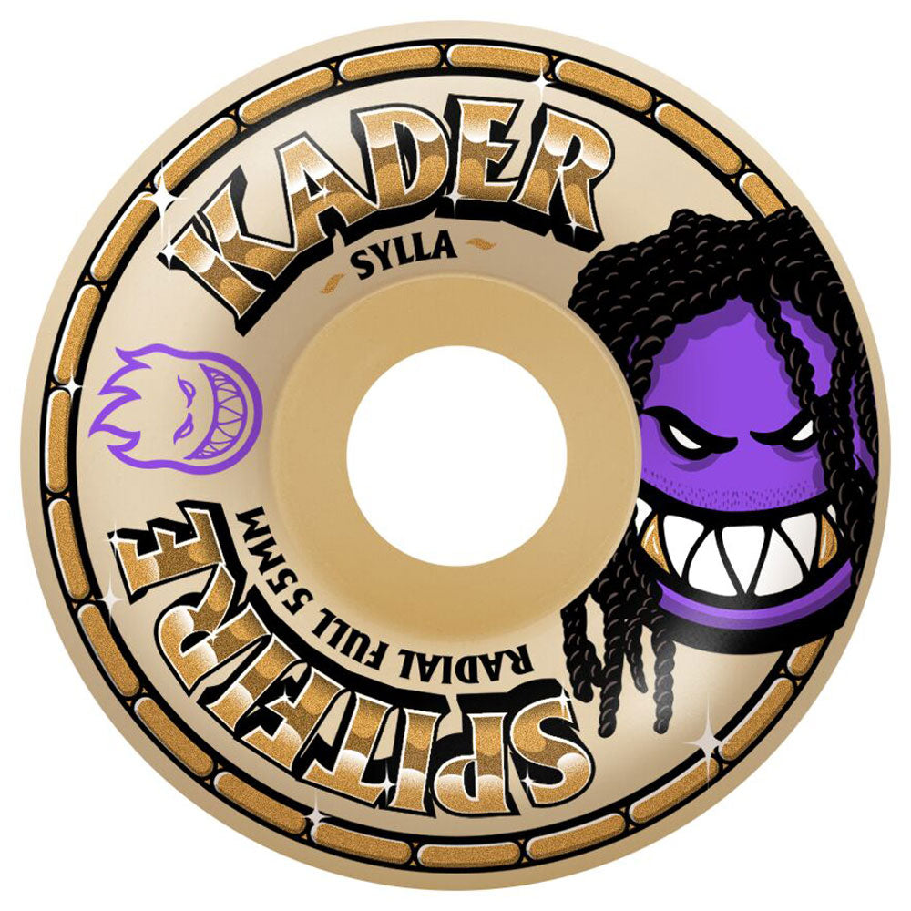 The Kader Rolly 55mm 99A F4 Spitfire Wheels showcase bold gold KADER SYLLA text, a vivid purple face with dreadlocks and sharp teeth, and a dynamic purple flame graphic, all set on a beige wheel with SPITFIRE RADIAL FULL 55MM branding around the edge—delivering signature Kader Rolly style to your setup. Also offered in a 53mm option for varied performance.