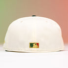 The La Cumbia WS05 Chrome Black Mexico Houston Astros New Era Hat 5950 Fitted is shown from the back, featuring the MLB logo in gold, green, and red embroidery above the adjustable area—a subtle yet stylish nod to Houston Astros fans.