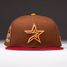 The Bendicion de la Abuela 20th Brown Red Houston Astros New Era Hat 5950 Fitted features a brown crown, yellow and red star logo, and a red brim, shown on a neutral background.