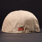 The La Playa Roja 35th Red Camel Houston Astros New Era Hat 5950 Fitted is shown from the back, featuring a small red and gold Astros logo at the bottom center, set against a plain black background.