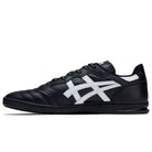 The Leggerezza Asics Black Bright White 1201B045 skateboarding shoes feature black leather, a white Asics logo, black laces, a low-profile sole, and breathable mesh for comfort, shown in side view on a white background.