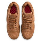 A top view of the Light British Tan IQ6827200 Paul Rodriguez Zoom Air Low Suede Skateboarding Shoes by Nike, featuring a pair of brown suede sneakers with matching laces, a red patterned insole, leather detailing on the upper, and displayed side by side on a white background.