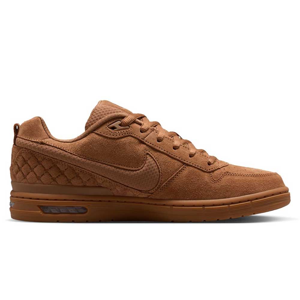 Introducing the Light British Tan IQ6827200 Paul Rodriguez Zoom Air Low Suede Skateboarding Shoes: featuring a brown suede upper with a low-cut silhouette, quilted detailing on the heel, and visible Zoom Air cushioning in the sole. Finished with a durable rubber outsole for enhanced traction and support.