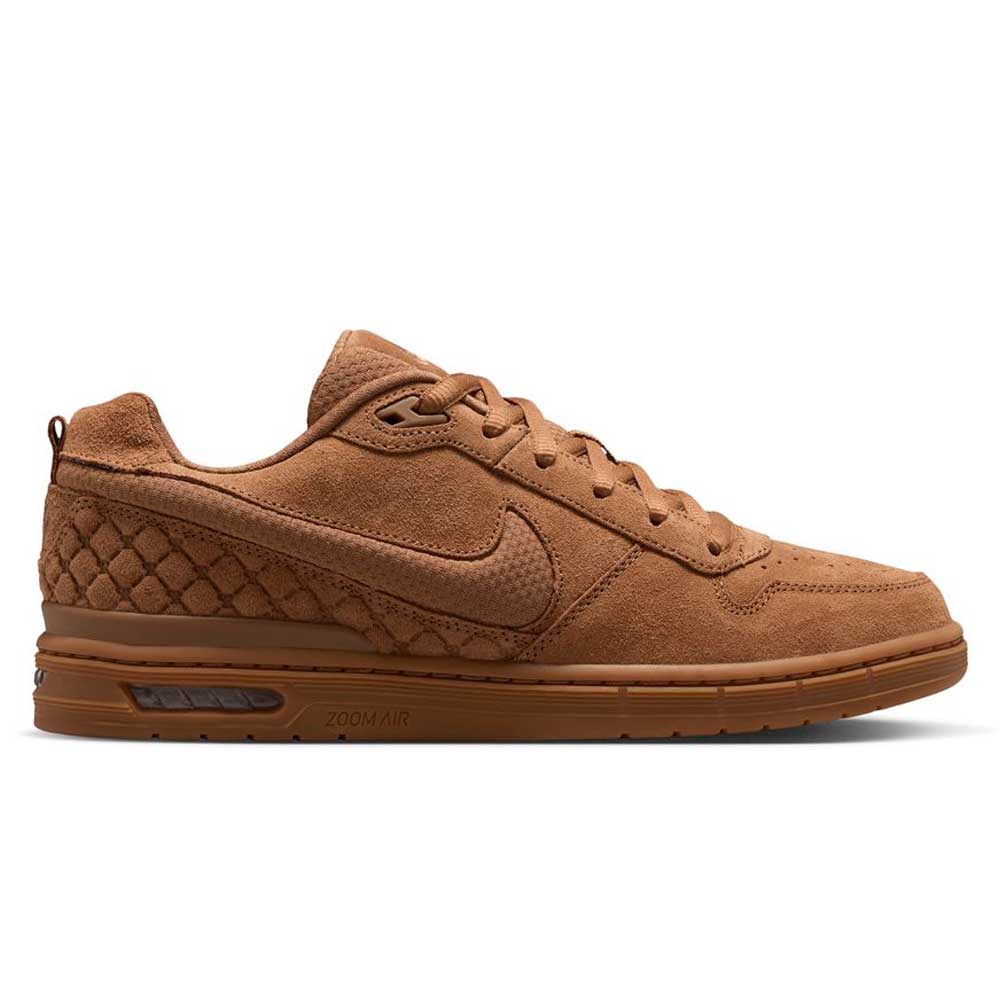 Light British Tan IQ6827200 Paul Rodriguez Zoom Air Low Suede Skateboarding Shoe features a brown suede upper with a low profile design, textured side panels, matching laces, and a visible Zoom Air cushioning unit in the sole. The Nike Swoosh logo is displayed on the side. The shoe is shown in a side view against a white background.