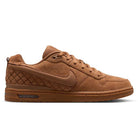 Light British Tan IQ6827200 Paul Rodriguez Zoom Air Low Suede Skateboarding Shoe features a brown suede upper with a low profile design, textured side panels, matching laces, and a visible Zoom Air cushioning unit in the sole. The Nike Swoosh logo is displayed on the side. The shoe is shown in a side view against a white background.
