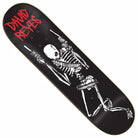The Lion 8.25 Sandoval Zero Skateboards Deck features a bold black design with a white skeleton holding pistols, "DAVID REYES" in striking red at the top left, and gold, black, and red accents that highlight the artwork by Micha Ulrich.