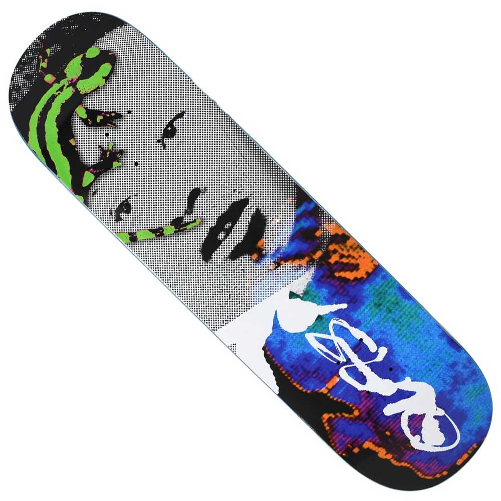 The Lizard King 8.5x32.12 Quasi Skateboards Deck Multicolor features a pixelated black-and-white face, colorful abstract patterns, and a stylized white Lizard King signature on the lower right side.