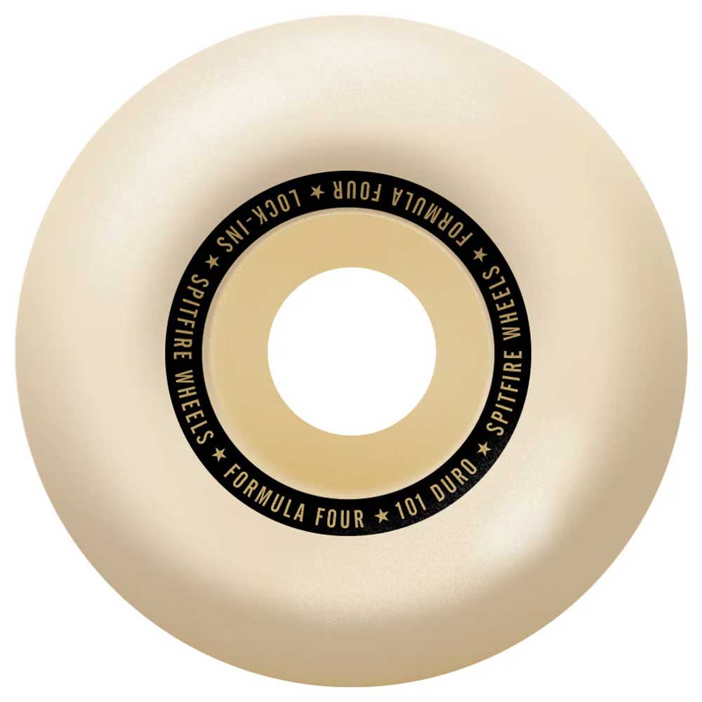A cream Spitfire Lock In 53mm 101A Formula Four skateboard wheel has a hollow center and a black ring with gold "Formula Four Lock-Ins 53mm 101A" text near the middle.