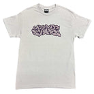 The Logo Tee Gray Purple Late Nite Stars features “LIFETIME SUPPLY” in bold, purple graffiti-style text screenprinted across its light gray-purple chest.