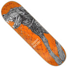 The Martinez Guero Pro 8.6in x 32.11in Creature Decks skateboard is crafted from durable North American maple and features an orange background with a dramatic illustration of a snarling black wolf on a chain, baring its teeth with its mouth wide open.