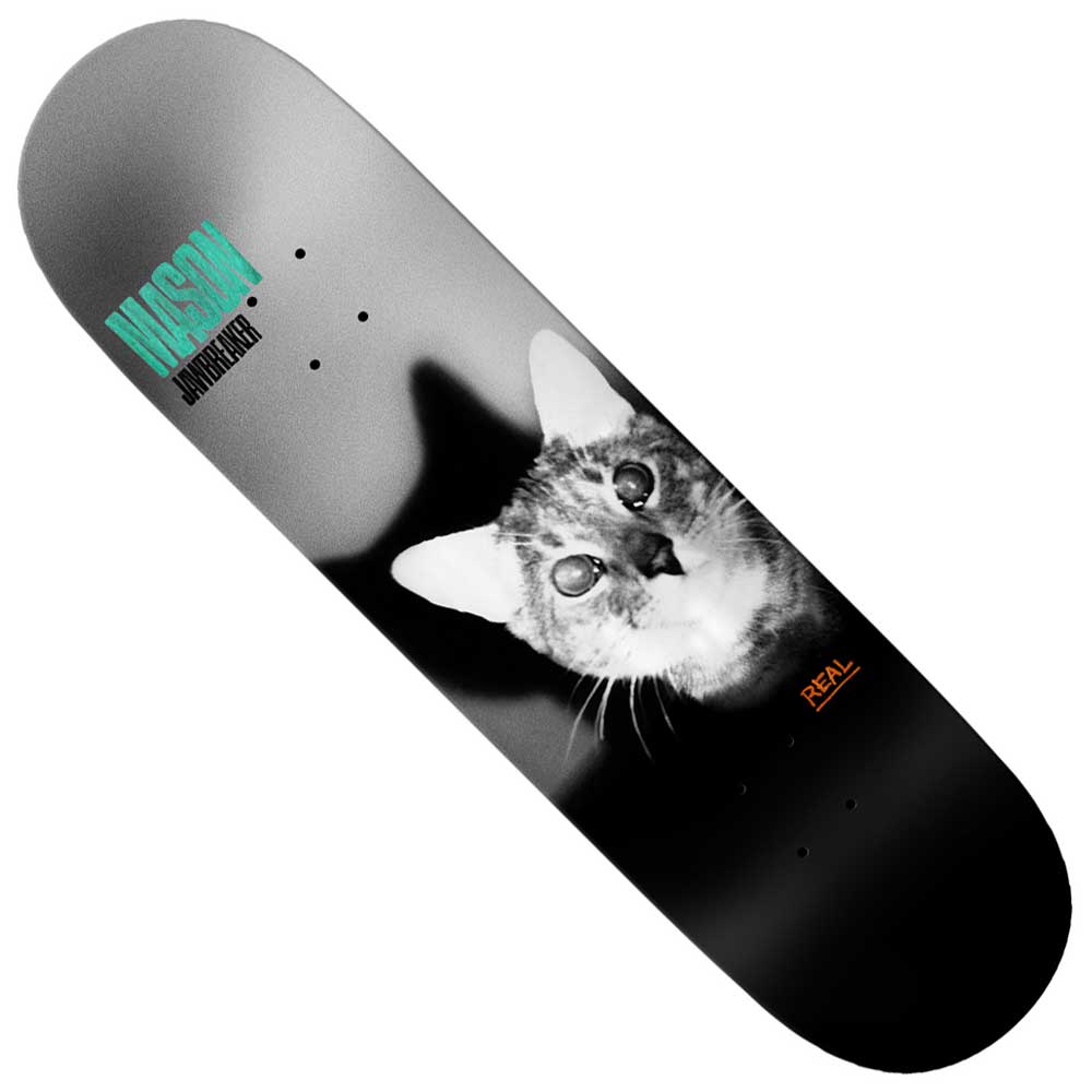 The Mason Jawbreaker 8.28x31.7 Unfun Black Real Skateboard Deck features a black and white cat’s face, with teal “MASON JAWBREAKER” and “SILAS BAXTER-NEAL” at the top, and orange REAL branding near the bottom.