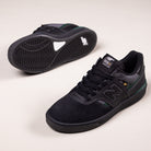 A pair of Black Nightwatch Green Jamie Foy Cup 306 CSP New Balance Numeric suede skateboarding shoes are displayed on a light surface—one shows the top and side, the other reveals the sole.