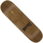 The Martinez Blade Pro 8.58in x 31.74in Creature Skateboard Deck is a brown wooden deck with "MARTINEZ" in bold black letters on one end and a small yellow graphic near the center, sold without wheels or trucks.