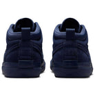 The Navy Black IR1889400 Leo Baker React Nike SB Suede Leather Skateboarding Shoes are shown from the back, featuring pull tabs, textured midsoles, and durable traction, displayed on a white background.