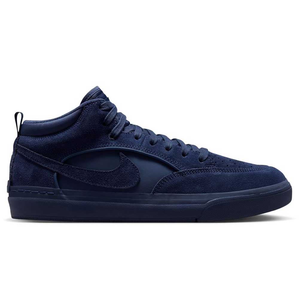 The Navy Black IR1889400 Leo Baker React Nike SB Skateboarding Shoes feature a suede leather upper, navy blue color, matching laces, iconic Swoosh, and a durable textured sole—perfect for those seeking signature Leo Baker skate style.