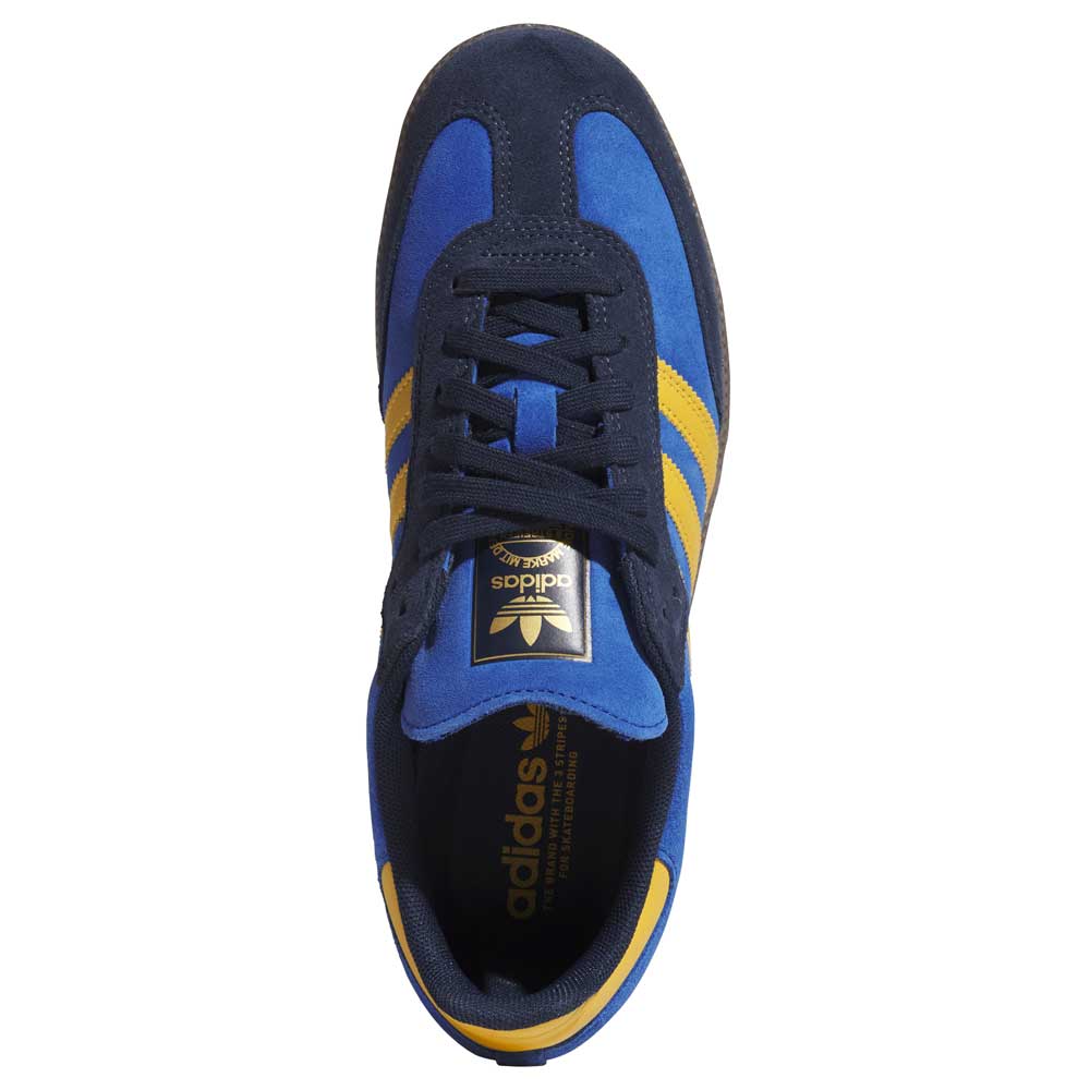 Top view of the Navy Yellow Gum Samba ADV HQ9283 Adidas Skateboarding shoes—leather and suede design features yellow stripes and a gold logo on the tongue, highlighting adidas innovation in skate footwear.