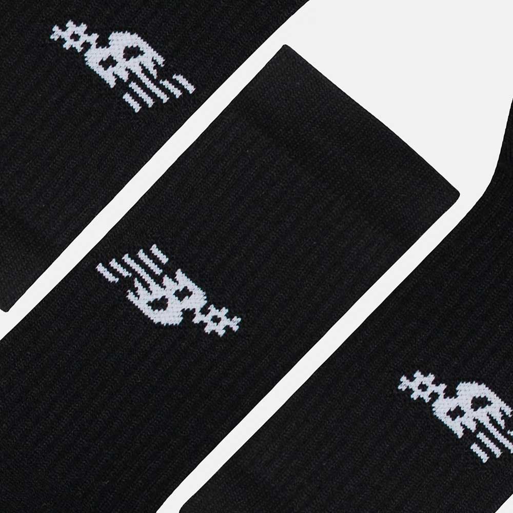 Three New Balance Numeric 3 Pack Socks Black (AC0048UBK) with white abstract logo near the top, featuring geometric shapes and lines, are arranged diagonally on a plain background. Each pair includes a cushioned footbed for comfort.