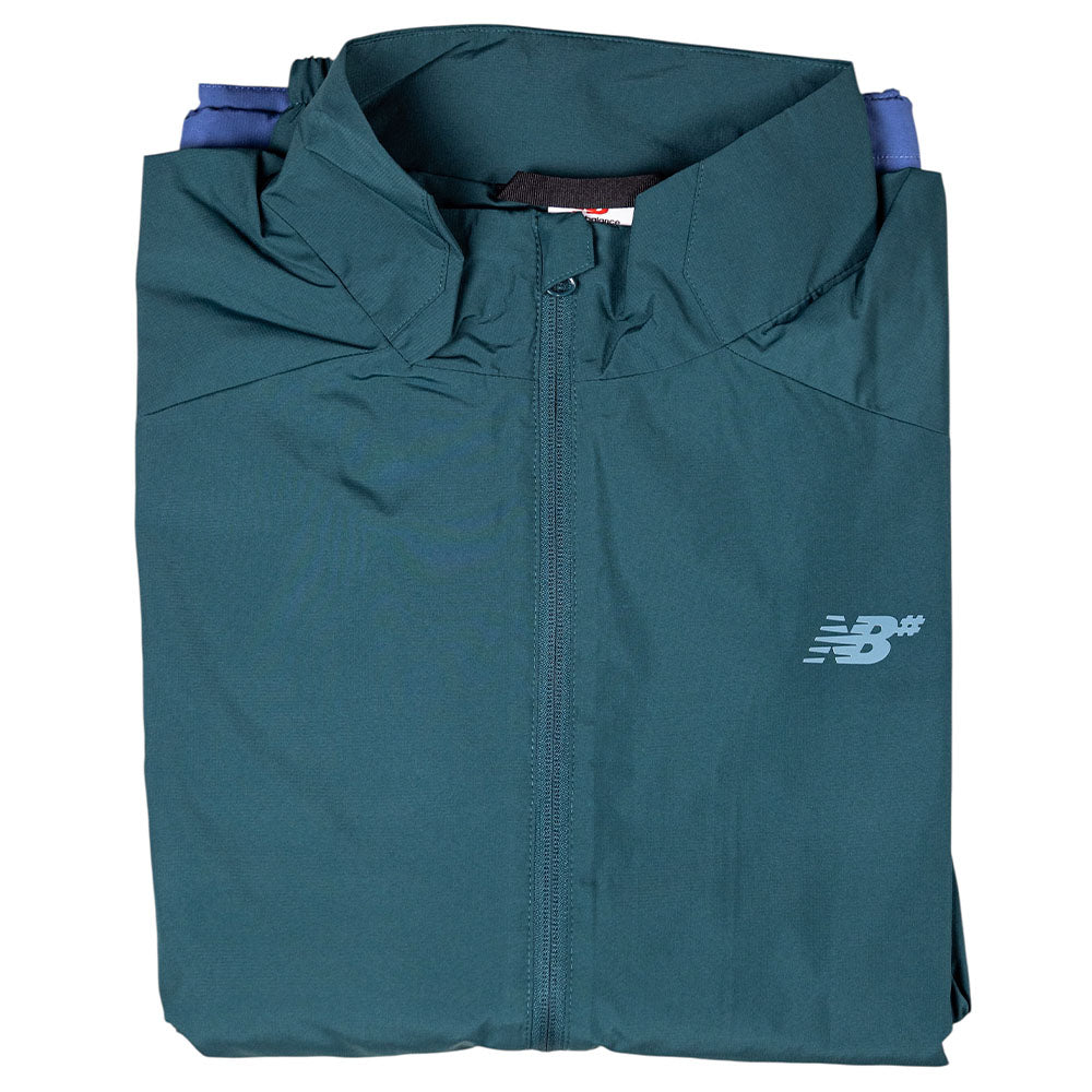 A folded New Balance Numeric Jacket MJ61W4XCAAV in dark green, featuring a front zipper, NB chest logo, and durable ripstop fabric, displayed on a white background.