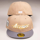 Two Chalino Skull Camel Storm Houston Astros New Era Hat 5950 Fitted caps are shown. The front cap has “Astros” in yellow/white with a star, grey brim, and a Chalino Skull patch; the back cap shows a small white patch.