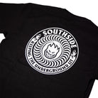 The Southside x Spitfire KTUL Pinwheel Black Tee features a bold circular white design with a flaming, grinning cartoon face at the center—an unmistakable tribute to Spitfire’s legendary style. Surrounding the circle is the text “SOUTHSIDE KEEPING THE UNDERGROUND LIT,” embodying Southside Skatepark’s energy in an Underground Lit Pinwheel motif.