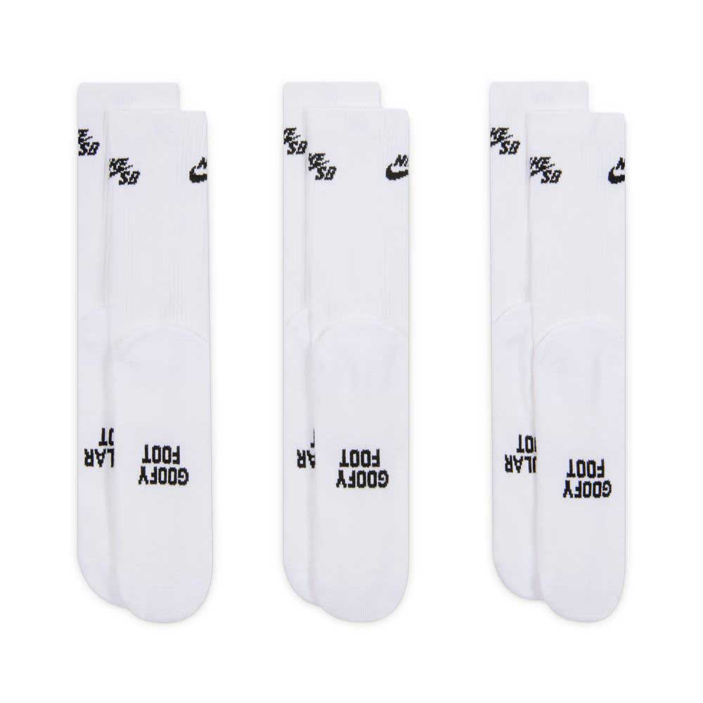 Three pairs of Nike SB Everyday Elevated 3 Pack IR1328910 White Black Crew Socks are displayed side by side, each featuring a black Nike logo near the top and the words GOODBY FOOT and LAR printed in black on the toes.