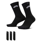 A set of Nike SB Everyday Elevated Crew Socks (3 Pack, IR1328900) in black with white Nike logos, featuring Dri-FIT technology for moisture management, is shown with three additional pairs stacked vertically on the lower left.