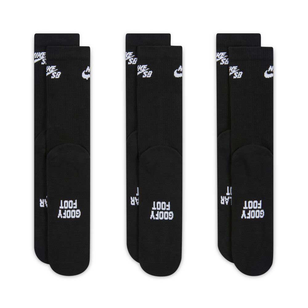 Three pairs of the Nike SB Everyday Elevated 3 Pack IR1328900 Black White Crew Socks are displayed upright. “NIKE SB” appears in white near the top, with “GOODY FOOT” printed in white on the soles. Designed as ideal workout socks, they feature Dri-FIT technology to help keep your feet dry and comfortable. The socks are arranged side by side against a white background.
