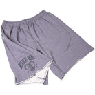 The IF1602065 Gray Sweat Short Skate Shorts by Nike SB feature a light gray color, loose fit, elastic waistband, side pockets, and a roaring bear graphic with "BIG 88" on one leg. Machine washable; shown laid flat with the inside of one leg slightly exposed.