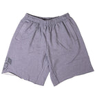 The IF1602065 Gray Sweat Short Skate Shorts Nike SB feature a loose fit, elastic waistband, side pockets, and a small dark logo on the lower left leg. These light gray shorts are machine washable for easy care.