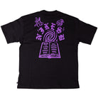 The Purple Black Tee IR6747010 T-Shirt from Nike SB features a large purple skateboarding graphic on the back with mystical symbols and text. Crafted from midweight cotton, it offers durable comfort and a roomy fit for daily wear.