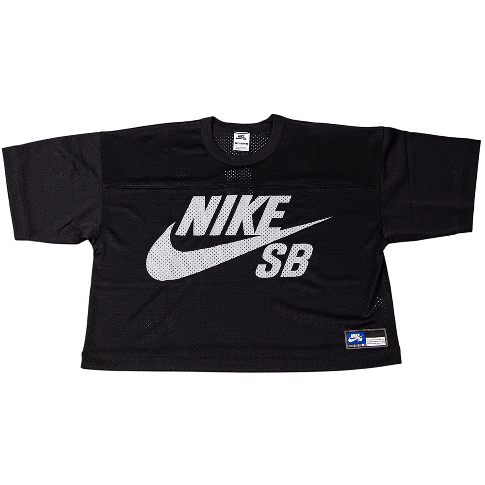 The Perforated Cropped Black Jersey IF1349010 is a short-sleeve Nike SB Skateboarding Tee featuring a large white Nike SB logo and swoosh on the front, imported polyester body, small logo label at hem, and is machine washable.