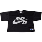 The Perforated Cropped Black Jersey IF1349010 is a short-sleeve Nike SB Skateboarding Tee featuring a large white Nike SB logo and swoosh on the front, imported polyester body, small logo label at hem, and is machine washable.